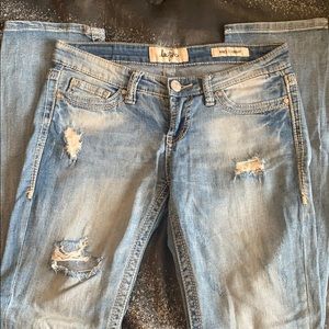 Distressed straight jeans.